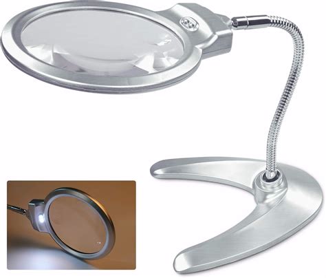 lighted magnifier on stand|illuminated magnifying glass on stand.